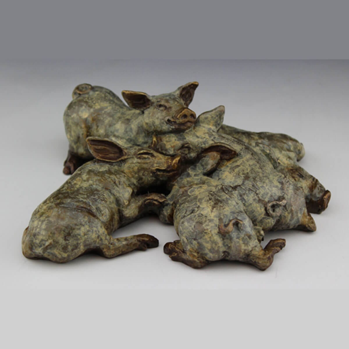 Bacon Bits bronze sculpture by Mark Dziewior at 7 Mile Creek Studio.