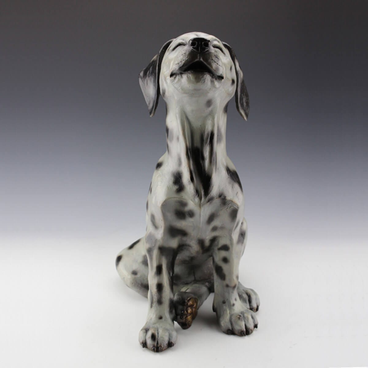 Dottie bronze dalmation dog sculpture by Mark Dziewior at 7 Mile Creek Studio.