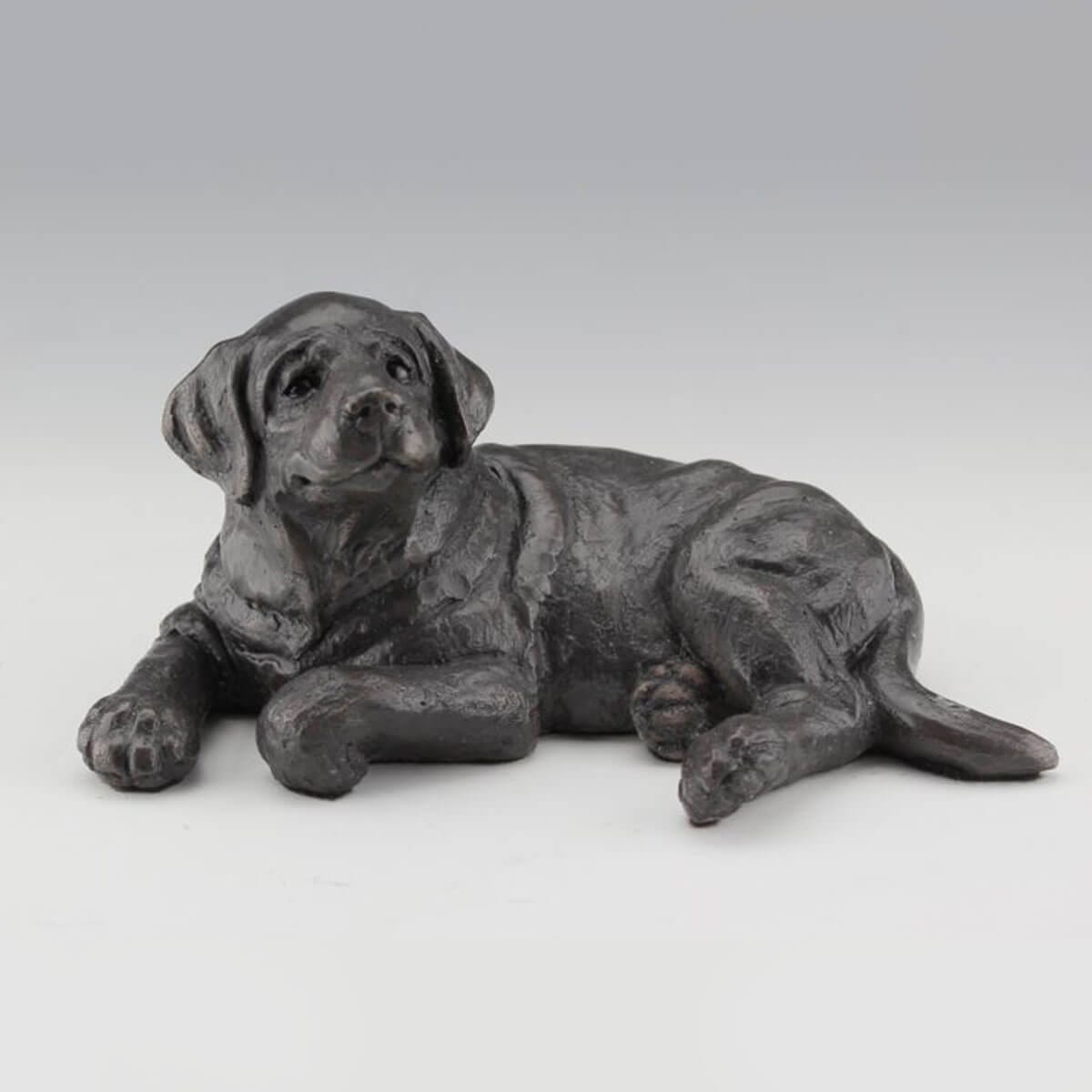 Just Chillin' bronze dog sculpture by Mark Dziewior at 7 Mile Creek Studio.