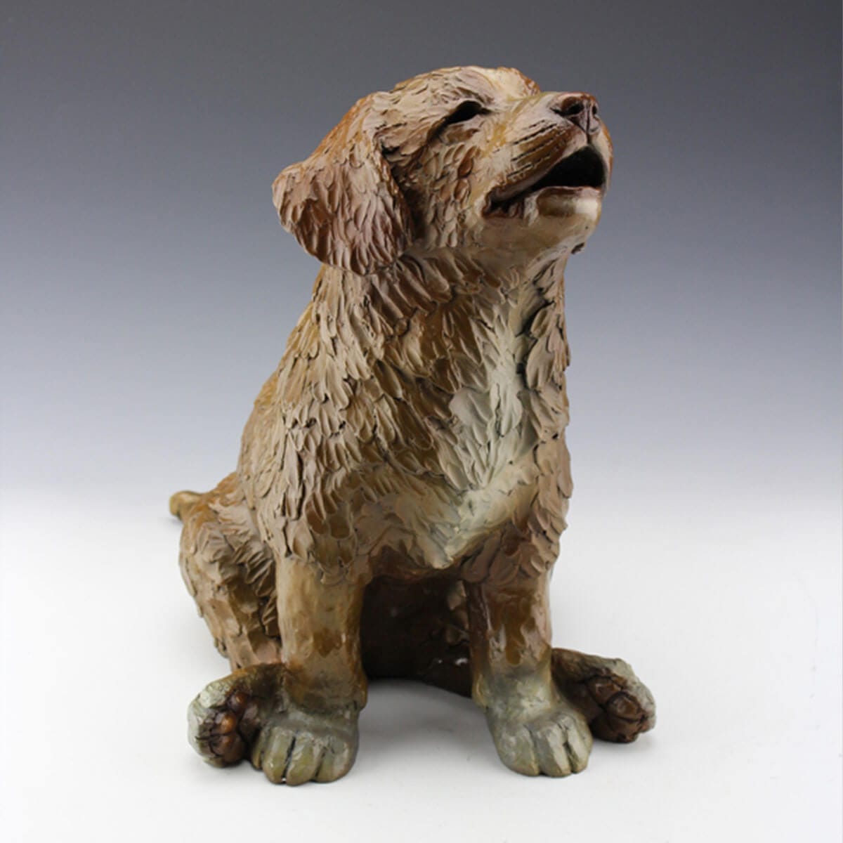 Nova bronze puppy sculpture bby Mark Dziewior at 7 Mile Creek Studio.
