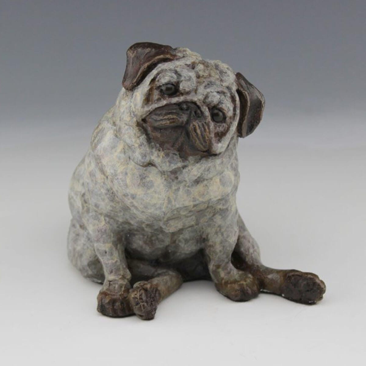 Puggins bronze pug sculpture by Mark Dziewior at 7 Mile Creek Studio.