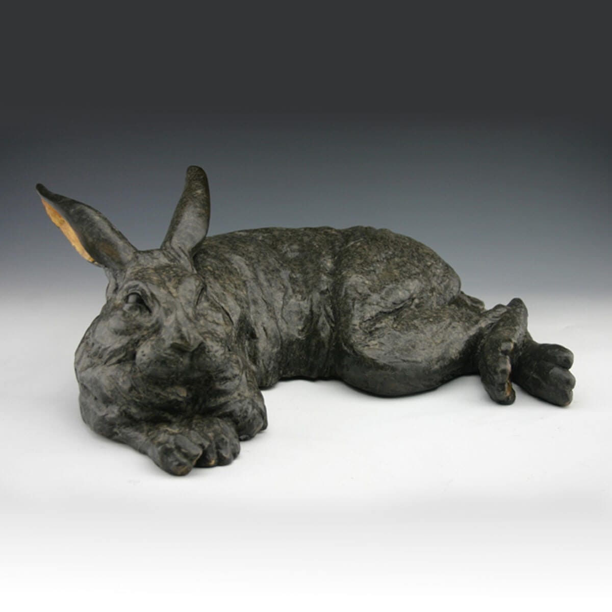 Rise and Shine bronze rabbit sculpture by Mark Dziewior at 7 Mile Creek Studio.